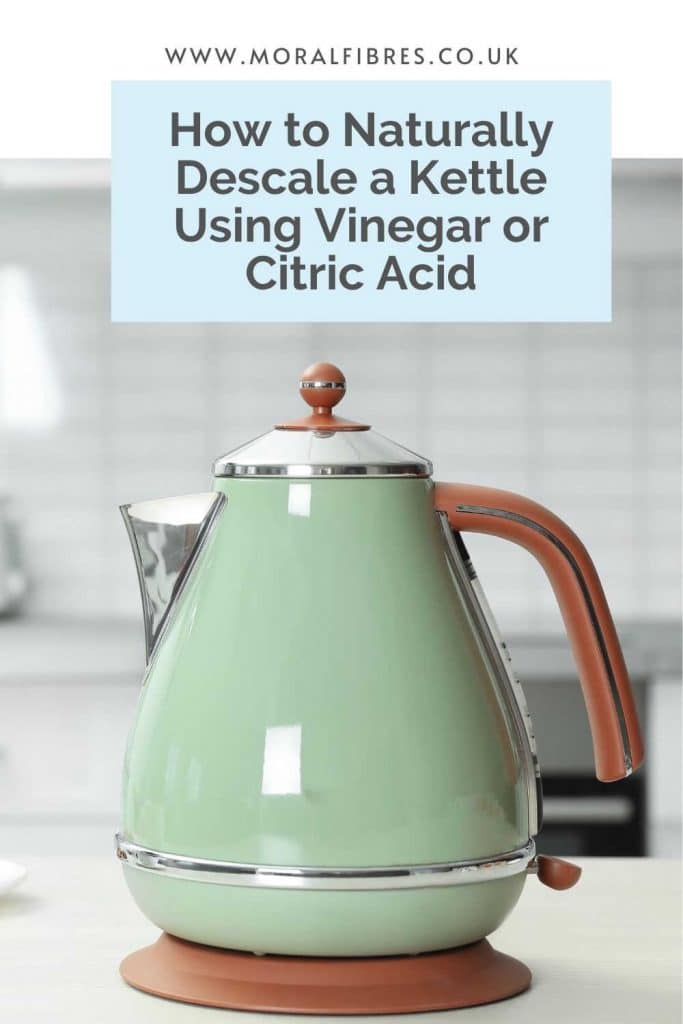 A green kettle on a white background with the caption how to naturally descale a kettle using vinegar or citric acid