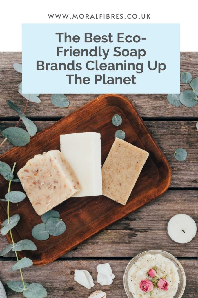 Image of three bars of soap on a wooden table, with a blue text box that says the best eco-friendly soap brands cleaning up the planet.