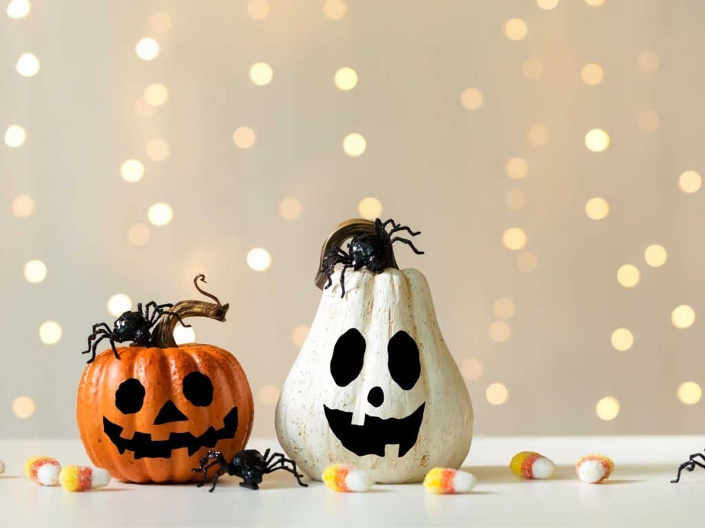 two spooky pumpkins