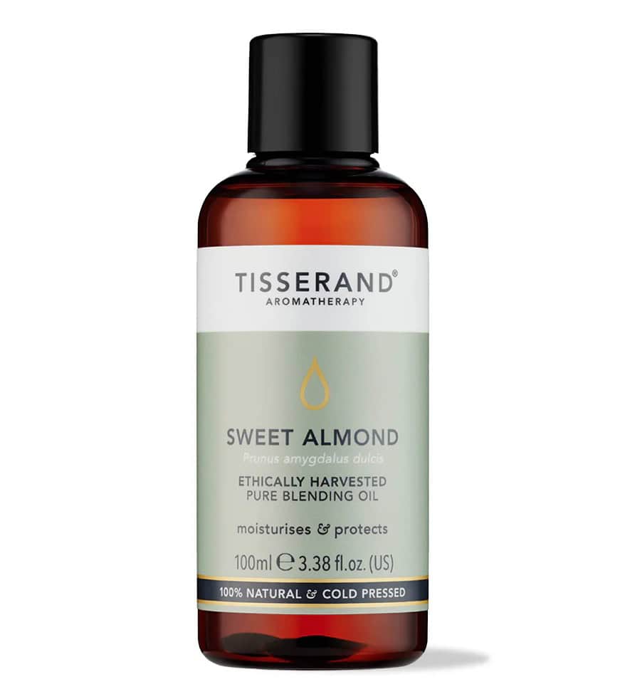 Bottle of sweet almond oil from Tisserand Aromatherapy, against a white background.